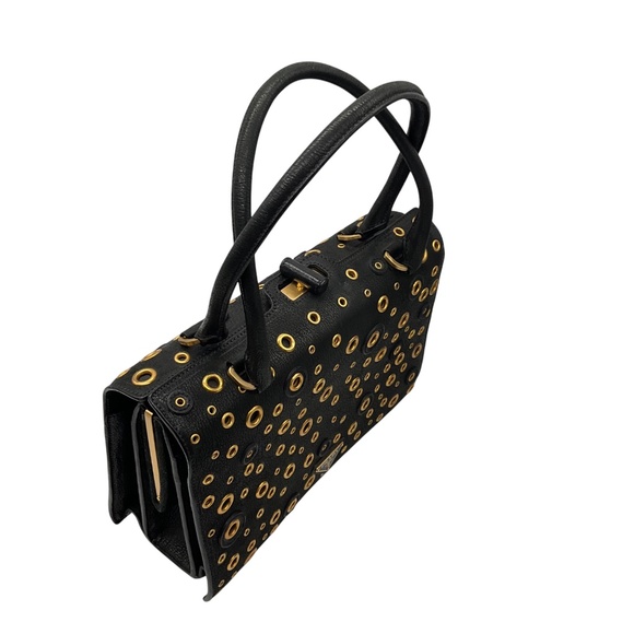 PRADA BLACK / GOLD GROMMET EMBELLISHED LOGO PLAQUE GRAINED LEATHER HANDBAG - Picture 4 of 13